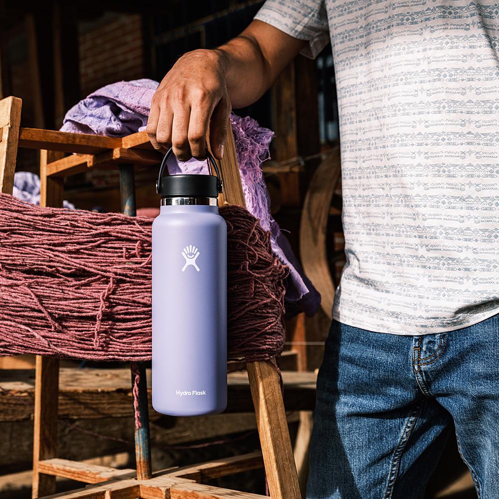 https://www.ronjonsurfshop.com/assets/51/46/5146bc82-9e6c-4ef7-819e-a2aa8d56ad78/97910213000-lupine-hydro-flask-40oz-wide-mouth-bottle-with-flex-cap-lifestyle.jpg