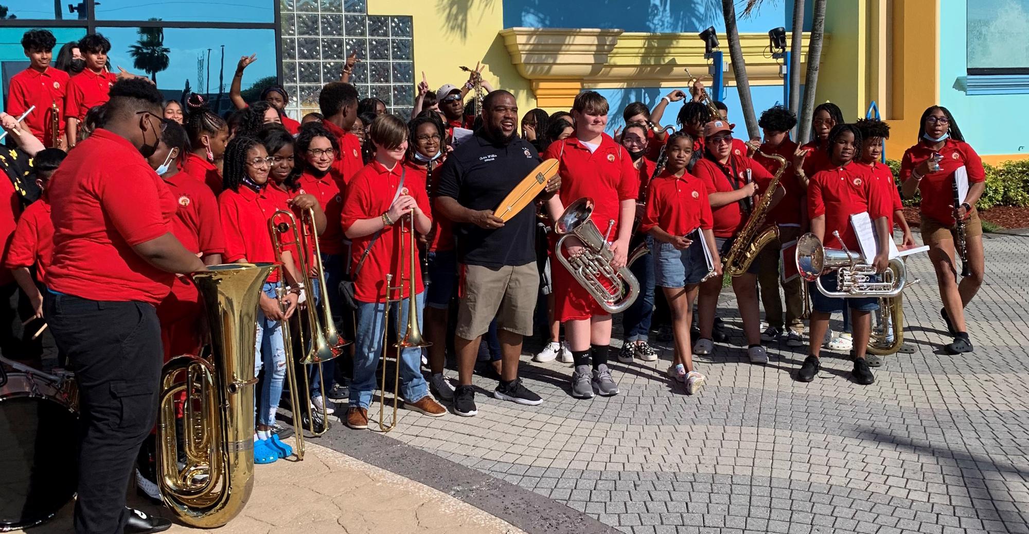 Photo of school band after they performed in front of the Cocoa Beach Ron Jon