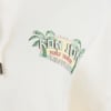 Close-up of a white garment featuring a printed design with palm trees and text reading Ron Jon Surf Shop Rip Curl.