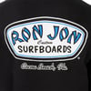A close-up of a Ron Jon Surfboards logo with Cocoa Beach, Fla. text on a black background.