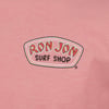 Close-up of a pink shirt with a Ron Jon Surf Shop logo in white and orange on the chest.