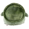 A round, green plush toy designed to resemble the back of a turtle with short legs and a textured shell pattern.