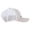 Side view of a light beige trucker hat with a mesh back and a rectangular patch on the front.