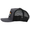 Side view of a gray and black trucker cap with a colorful patch on the front. The back is mesh, and the brim is curved.