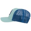 A light blue and dark blue mesh trucker hat shown from the side, with a curved brim and a patch visible on the front panel.