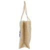 Side view of a woven straw tote bag with two handles, showcasing its rectangular shape and textured material.