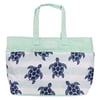 A mint green tote bag with patterned blue sea turtles and the words Ron Jon Surf Shop on the front.