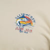 T-shirt with a graphic of a fish, waves, and a boat, featuring Salty Crew and Ron Jon Surf Shop text in blue and red.