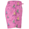 Pink shorts featuring colorful dinosaur surfing patterns and an elastic waistband with a drawstring.