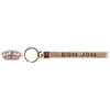 A rose gold keychain with a rectangular wrist strap labeled RON JON and an attached oval tag reading RON JON SURF SHOP.