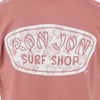 A close-up of a pink shirt featuring the Ron Jon Surf Shop logo with a floral hibiscus background design.