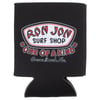 A black beverage coozie featuring the Ron Jon Surf Shop logo and the phrases One of a Kind and Cocoa Beach, Fla. printed on the front.