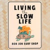 11840757000-ron-jon-living-the-slow-life-metal-sign-lifestyle.jpg