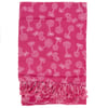 A pink scarf with white palm tree patterns and fringe detailing at one end, laid flat against a white background.
