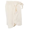 Beige cloth shorts with an elastic waistband, drawstring, and pockets, viewed from the side.