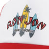 Close-up of a Ron Jon Surf Shop logo featuring three surfboards with palm tree silhouettes on a white and red background.