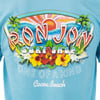 Blue shirt with a colorful Ron Jon Surf Shop graphic, featuring tropical flowers, palm trees, a sunset, and text reading One of a Kind and Cocoa Beach.