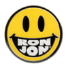 e A yellow smiling face with black oval eyes and the words RON JON in white letters forming the teeth of its smile.