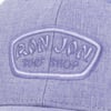 Close-up of a light blue cap with Ron Jon Surf Shop embroidered in white on the front.