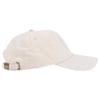 Beige baseball cap with an adjustable strap and metal buckle on the back, featuring an embroidered circular design on the front.