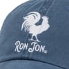 Blue cap with embroidered white rooster above the text Ron Jon in white lettering.