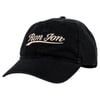 Black baseball cap with Ron Jon written in cream-colored script on the front.