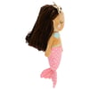 Stuffed mermaid doll with brown yarn hair, tan upper body, blue shell top, and pink polka dot tail, viewed from the side.