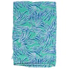 A folded piece of fabric featuring a green background with an abstract blue and white linear pattern.