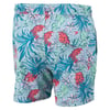 Colorful swim trunks with a tropical pattern of red pineapples, green leaves, and flowers on a light blue background.