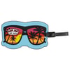 Sunglasses-shaped luggage tag with palm tree sunset reflection and Ron Jon Surf Shop logo on lens.