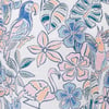 Patterned fabric with colorful illustrations of birds, tropical leaves, and flowers in pink, blue, and green tones.