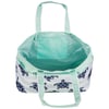 A mint green tote bag with navy blue turtle illustrations. It has two shoulder straps and an internal pocket. The interior lining is a light green fish scale pattern.