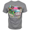 Back of a grey T-shirt featuring a colorful tropical design with a parrot, flowers, palm trees, and the text “Ron Jon Surf Shop, One of a Kind, Cocoa Beach, Florida.”.