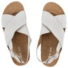 White open-toe sandals with crisscross straps and ankle buckles, displayed on a light background.
