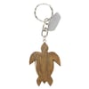A metal keychain featuring a wooden sea turtle-shaped pendant and a small silver tag attached.