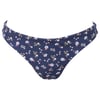 A pair of navy blue bikini bottoms with a floral pattern of white, yellow, and pink flowers.