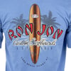 Blue t-shirt featuring a graphic of a surfboard, palm trees, and the text Ron Jon Custom Surfboards Est. 1959, Long Beach Island, NJ.