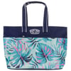 Tote bag with navy handles and top, featuring colorful tropical leaf patterns and a Ron Jon Surf Shop logo patch on the front.