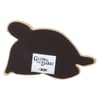 A black, turtle-shaped magnet with a small white label that reads Glow in the Dark! 