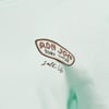 A light green shirt featuring a Ron Jon Surf Shop logo and the phrase Salt Life printed on the chest.