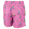 Pink swim trunks featuring a colorful dinosaur surfing pattern with suns and waves.