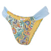 A pair of womens bikini bottoms featuring a paisley and floral pattern in yellow, blue, and teal with light blue side panels.