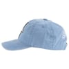 A light blue baseball cap with a curved brim and embroidered designs, shown from the side.