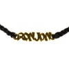 Gold Ron Jon pendant on a braided black cord.