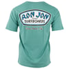 A green short-sleeve t-shirt with a large Ron Jon Surfboards, Cocoa Beach, Fla. logo printed on the back.