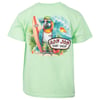 T-shirt with a colorful design of a parrot wearing sunglasses, holding a surfboard at a beach with a sunset. Text reads Ron Jon Surf Shop.