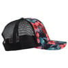 A black mesh-back cap with a floral pattern on the front and visor, featuring red and blue flowers and green leaves.