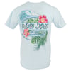 Light blue T-shirt featuring a graphic of a wave, tropical flowers, and leaves with the text ‚ÄúRon Jon Surf Shop Cocoa Beach‚Äù on the back.