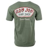 Green T-shirt featuring a Ron Jon Surf Shop logo and Cocoa Beach text on the back.