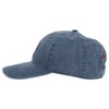 A faded blue denim baseball cap with a curved brim and red embroidery on the side view.